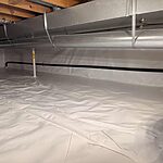 Sealed crawl space encapsulation in Wheaton, IL with vapor barrier installed by Premium Waterproofing for moisture control