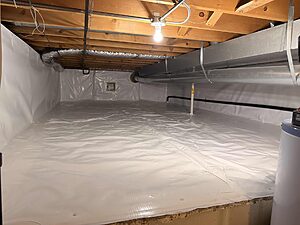 After crawl space encapsulation in Wheaton, IL with sealed vapor barrier installed by Premium Waterproofing for moisture control